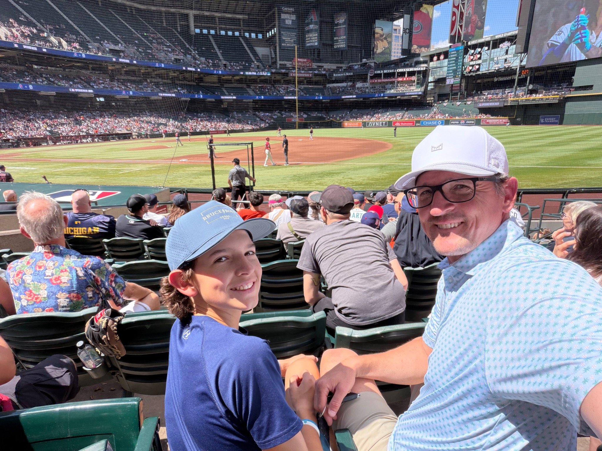 Brandon with Maverick at a baseball game