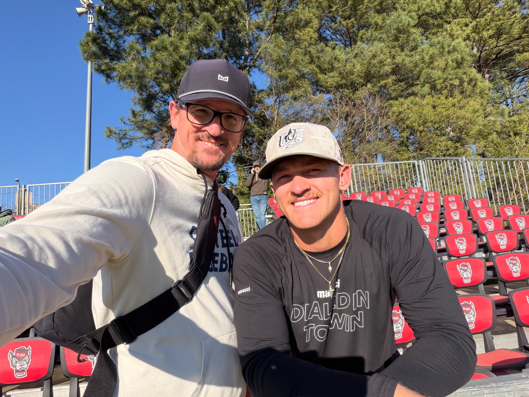 Brandon with Ryan at a baseball game